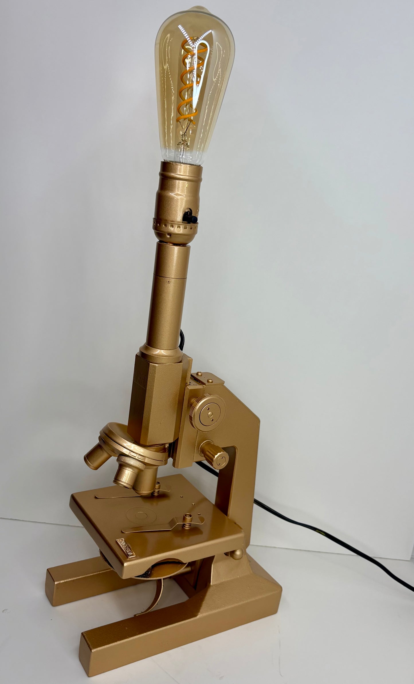 Microscopio Oro